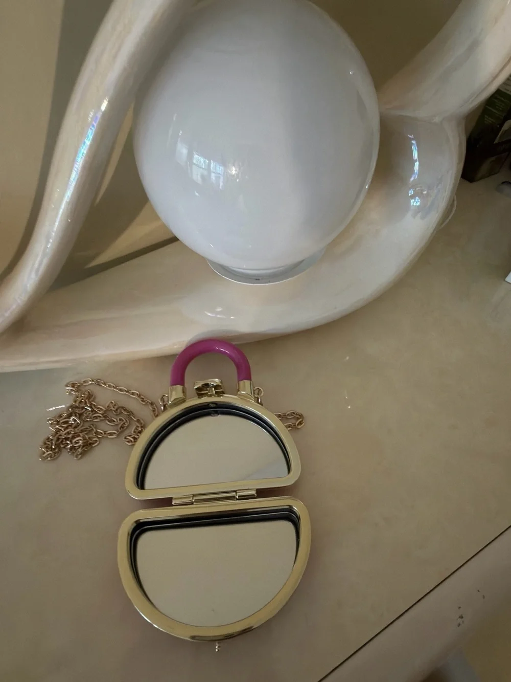 Chic  Pink Mini Dome Crossbody Clutch with Gold Chain.